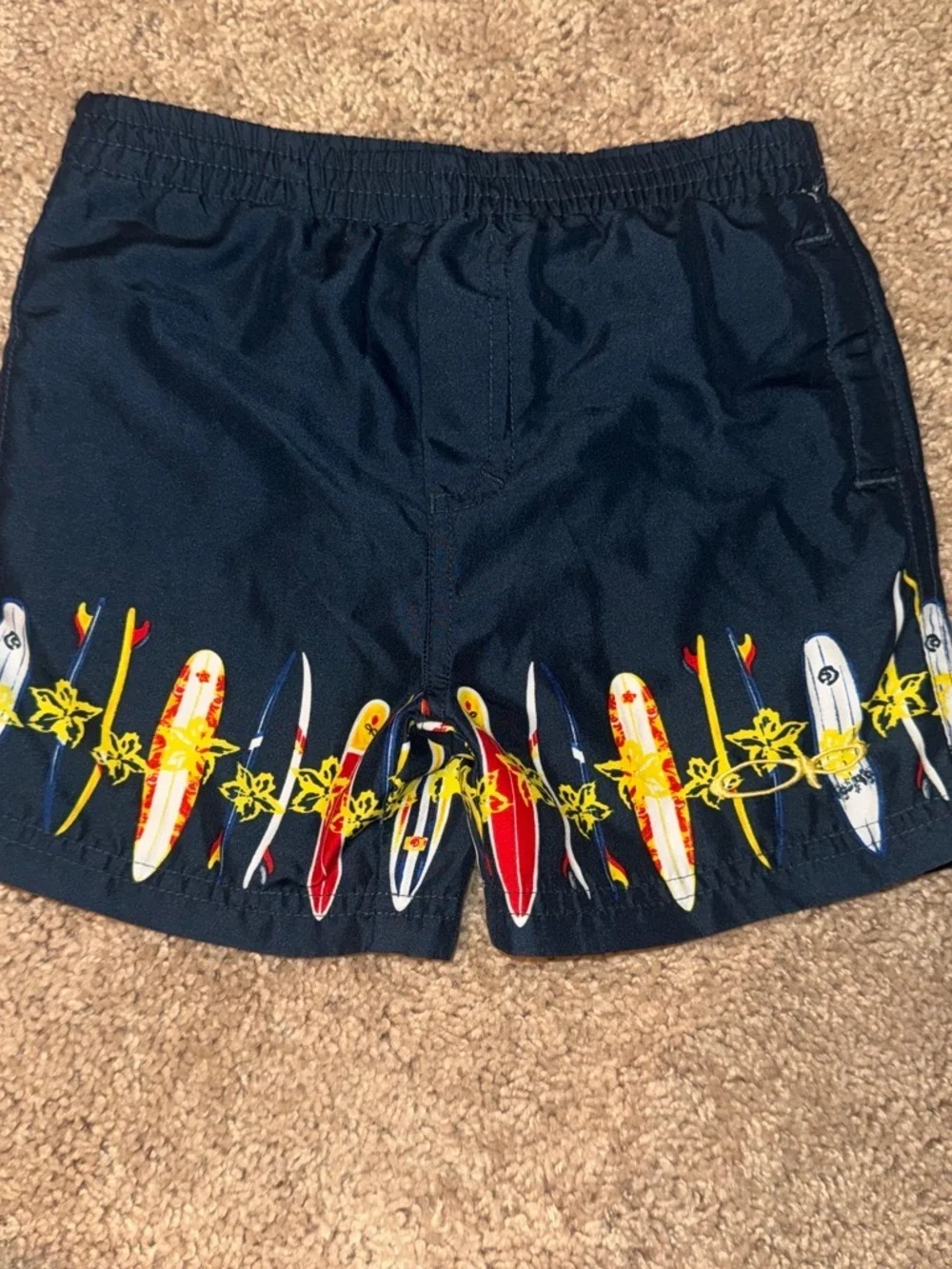 Navy Blue swim shorts with surfboards size 12m